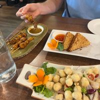 satay skewers, prawn toast, and salt and pepper tofu at Vegan Planet in North West London