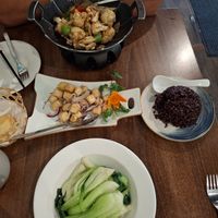 Bok choy in garlic sauce, cauliflower, fried tofu and steamed black rice at Vegan Planet in North West London
