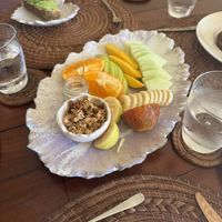 Seasonal fruit platter - the home made granola was really good  at BIO at Xcaret Mexico in Playa Del Carmen