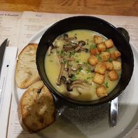 Some sort of potato soup with mushrooms, croutons and slices of bread at L'angolo Italiano in Vejle