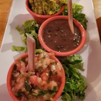 Pico de gallo, refried beans, and guacamole appetizer at Tuluum 110 - Cocina Mexicana in Aguadilla
