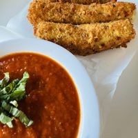 Mozzarella sticks made with potato starch!   at Fiction Kitchen in Raleigh