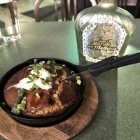 Cast Iron Skillet Cornbread with Hickory Syrup Drizzle & Vegan Butter  at Fiction Kitchen in Raleigh