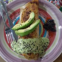 Huge Burrito with tasty vegan-meat filling, delicious & creamy green souce at Huerto En El Barrio in Guadalajara