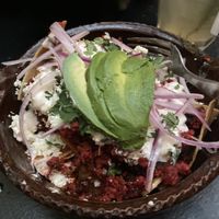 Chilaquiles con rojo sauce/spicy and tasty addictive   at Umami in Mexico City