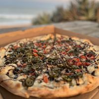 Mushroom balsamic, add spinach- jalapeños to one side   at Tony's Pizza in Flagler Beach