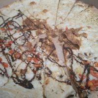 Half balsamic and half white. The center was overcooked which has not happened for previous orders. at Tony's Pizza in Flagler Beach