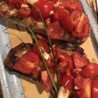 Bruschetta with fresh tomatoes, garlic and red hot chilli pepper  at Birrificio Torino in Turin