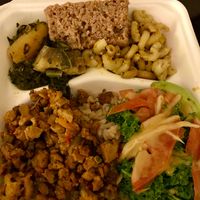 Vegan plate: Soy Curry, rice n’ peas, Mango & Kale Salad, plantains/collard greens, Mac n’ cheeeeeeeeese! 😋 at Rasta in Nassau