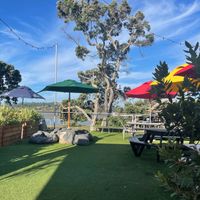 Great outdoor seating looking out over the water.  at Mangawhai Tavern in Mangawhai