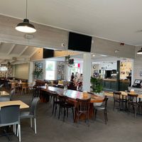 Indoor Seating Area with Bar at Mangawhai Tavern in Mangawhai