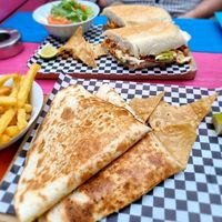 Torta chorizo and gringa milanesa and fries at Pura Vida Vegan Tacos in Antwerpen