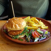 Crispy chicken burger with mozzarella in the bun at Pura Vida Vegan Tacos in Antwerpen