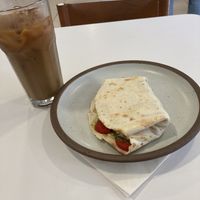Vegan Just Egg toasted breakfast wrap and iced coffee with oat milk. Delicious!  at Casa Blanca Coffee Roasters in Wilmington