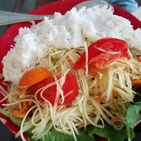 Green papaya salad with coconut rice at Tina's Garden Gourmet Cafe in Hilo