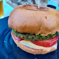 Burger with quinoa patty at nube in Spilamberto