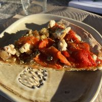 Amazing pizza with a really good vegan cheese, eggplant and bellpapper.  at Les Escales in Sant Cugat Del Valles