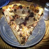 Large vegan pizza slice at The Boiler Room in Chicago