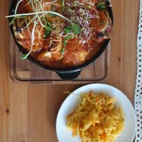 Tofu dumplings baked in the oven with tomato-sauce at Pod Przykrywką in Wroclaw