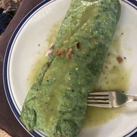 Vegan beyond meat burrito with avo salsa on top at Salsas Taco Bar in Santa Cruz