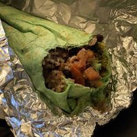 Bite of the vegan burrito at Salsas Taco Bar in Santa Cruz