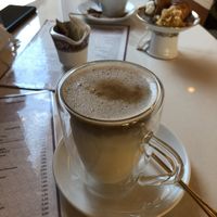 Iced Soy Latte (candy in background not vegan 😢)  at Linda Chirico Ofelè in Porto Ceresio