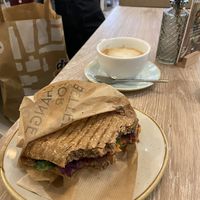 Sandwich with sweet potato and spinach and a cappuccino with oat milk   at Dean & David - Lister Meile in Hannover