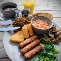 The breakfast - Vegan breakfast (sausage, mushrooms, tomatoes, avocado, smashed falafel, multigrain toast, sautéed spinach and beans).  at North Sea Observatory in Chapel St Leonards