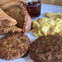 Vegan French Toast w/ “eggs” and “sausage"  at Biscuits Cafe in Surprise