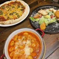 Picante pizza, cesar salad and gnocci.   at Vegan Garden Budapest in Budapest