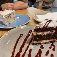 Coconut cake (closest) & plum cake   at Vegan Garden Budapest in Budapest