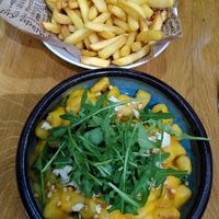 Fries and gnoccis with pumkin sauce at Vegan Garden Budapest in Budapest