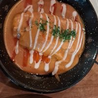 Stuffed pancake with paprika sauce at Vegan Garden Budapest in Budapest