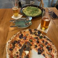 Risotto and pizzaa  at Vegan Garden Budapest in Budapest