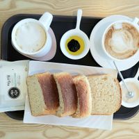 loaf of fresh bread with sauces and coffee at Fortunate Coffee - 씽푸커피 in Ansan