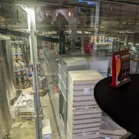 View into the brewery from the restaurant at Curious Brewery in Ashford