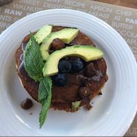 Bitter tasting pankcakes, beautifully presented though, just not for me 🌿 at Passion Cafe Playa den Bossa in Ibiza