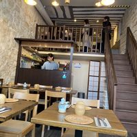 Small premises, designed with minimalistic wood aesthetic  at Ai's Bento in Paris