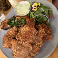 Fried mushrooms with salad and sweet potato  at Pierwszy Stopien in Krakow