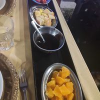 Dessert: fruit with melted chocolate at Serendib in Milan