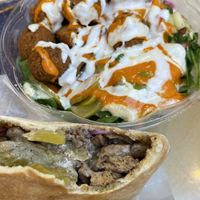 Falafel Bowl (I added the vegan sauces: red, mazbout, garlic) and shawarma sandwich !  at Falafel Inc - Tysons Corner in Tysons Corner