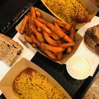 Currywurst with bread, sweet potato fries and vegan mayo  at My Currywurst in Stuttgart