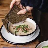 Flavorful soups and delicious cracker bread.   at Wild & The Moon - Ave de Champs Elysées in Paris