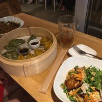Shanghai noodles with tofu (left). Mix of curry and healthy green dumplings. Kay’s noodles with tofu (right).  at Wanna Eat in Berlin