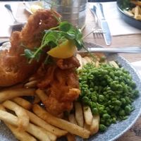 Battered banana blossom, chips, minty mushed peas and a lovely dipping sauce.. at The Lyme Bay Cafe and Bar in Lyme Regis