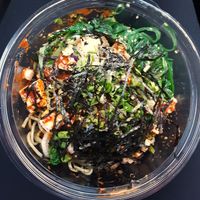 Regular size Full Kale Noodles (+$1.25) bowl - tofu, cucumber, sweet onion, cabbage, edamame, kale, cilantro, medium Spicy Sweet Chili Gochujang flavor, seaweed salad, nori, & more at Pokeworks in Omaha