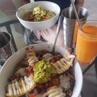 Bowl tico in the front and the zucchini past curry at Varuna Plant-Based Food & Juice Bar in Manuel Antonio