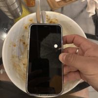 iPhone comparison of how big the bowls are  at Varuna Plant-Based Food & Juice Bar in Manuel Antonio