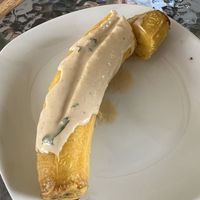 Plantain with tahini, not cooked, would not recommend   at Varuna Plant-Based Food & Juice Bar in Manuel Antonio