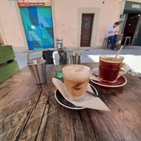 Coffee americano and cappucino with soy milk. Both on ice at Garage Coffee in Barcelona
